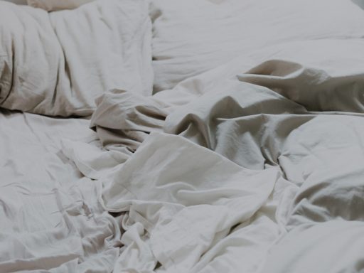 white pillows and bed comforter